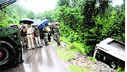 Officials at Dhundak in Poonch, where a bus fell into a gorge on the Jammu-Poonch highway, in the jurisdiction of Surankote police station