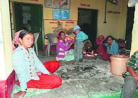 Pulna residents take refuge at a school in Joshimath