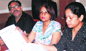Complainant Anu Bhandari (centre) at a press conference in Sector 10, Chandigarh.
