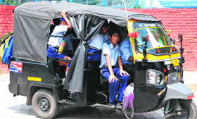 An overloaded auto-rickshaw at Sector 10 in Panchkula.