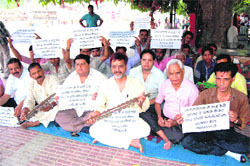 Teerth Maryada Raksha Samiti activists who sat on agitation, demanding the registration of Kanwariyas in Haridwar.