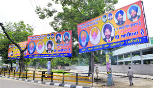 Despite action by Ludhiana Municipal Corporation officials, illegal political hoardings of the ruling Shiromani Akali Dal (Badal) still dot the city roads in Ludhiana on Sunday.