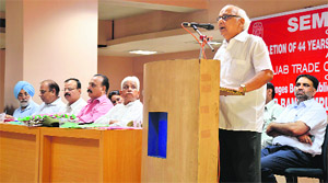 Rajen Nagar, president of All-India Bank Employees Association, speaks at a seminar in Ludhiana on Sunday. 
