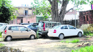 Vehicles dumped by the police at Government Veterinary Hospital at Balongi village in Mohali. 
