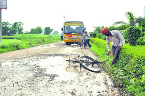 A road that links several villages with the Banur-Ambala highway in a pathetic condition. 
