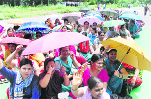 Teachers stage protest in Sector 5, Panchkula, on Monday. 