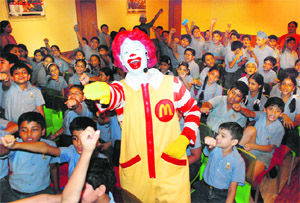 Ronald McDonald with the students of The Gurukul School in Sector 20, Panchkula, on Monday.