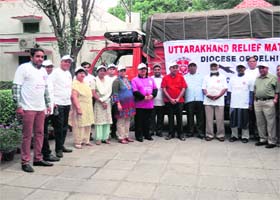 The Diocese of Delhi, CNI, followers along with the relief material in Dehradun on Monday