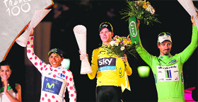 Tour de France winner Christopher Froome, second-placed and best climber's polka dot jersey Nairo Quintana (left) and third-placed Joaquim Rodriguez Oliver pose on the podium in Paris on Sunday.