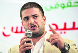 Osama, son of Mohamed Mursi, in Cairo on Monday.  AFP