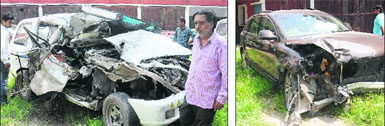 Sahils father Yashpal Juneja stands beside the damaged Tavera; and (right) the mangled remains of the Audi car.