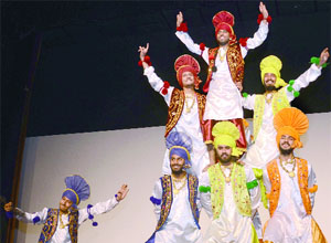 Students performing a Bhangra during the orientation function for freshers at Khalsa College, Delhi University on Tuesday.
