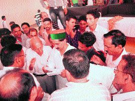 Kewal Singh Pathania, Vice-Chairman, Forest Corporation, listens to the grievances of people at Shahpur on Tuesday. 
