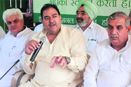 INLD leader Abhay Chautala addresses a press conference in Chandigarh on Tuesday.