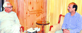 The Governor, in a meeting with Khalid Bashir Ahmed, Secretery, Jammu and Kashmir Academy of Art, Culture and Languages, in Srinagar on Tuesday.