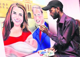 Prince charming: Painter Jagjot Singh gives final touches to his painting of the Duke and Duchess of Cambridge with their newborn baby in Amritsar on Wednesday
