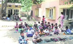 Teachers take classes in the open grounds in Government Primary School in Faridkot. A Tribune photograph 