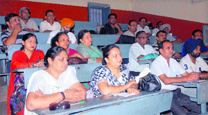 Aided school teachers at a meeting in Jalandhar on Wednesday. 