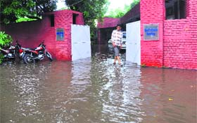 A flooded premises of the DC's residence after heavy rain in Ludhiana
