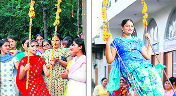 Women enjoy swings during the celebration of Teej festival in Amritsar on Thursday
