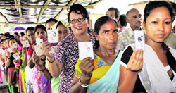 Voters queue up at Dabgram in Jalpaiguri during the final phase of the panchayat poll in Bengal on Thursday.  PTI
