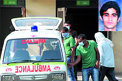 Relatives of Pradeep (inset) take his body for the post-mortem at the Sector 6 General Hospital in Panchkula on Friday