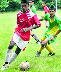 Players in action during a football match at Government Model Senior Secondary School, Sector 22, in Chandigarh on Friday