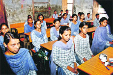 Class VIII students without textbooks in a Jhajjar school.