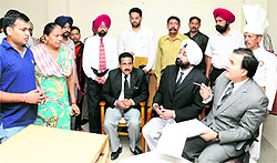 The High Court Judge along with the judicial officials listens to the views of the people