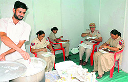 Women cops enjoy traditional food at the Bebe Di Rasoi stall put up at the fest at the community centre in Model Town phase-3 in Bathinda