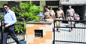 Police personnel leave Union Minister Manish Tewaris house in Sector 19, Chandigarh, on Saturday.