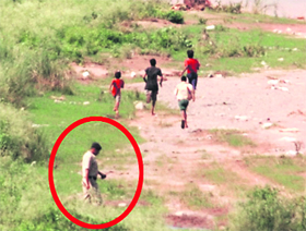 children run away on seeing a policeman in Panchkula on Saturday.