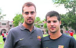 Spanish coaches from FC Barcelona Antoni Cleveria (left) and Jordi Arasa.