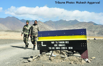 A file photo of Indian soldiers near the LAC in Ladakh. China has developed infrastructure right on its borders, but India is woefully short of roads, tracks and airstrips along its frontiers.