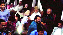 A video grab shows Grand Mufti Bashir-ud-din (in white) listening to ghazals at a cultural event in Srinagar