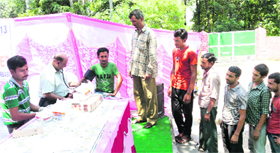 A driver undergoes medical treatment during a camp in Reasi on Saturday.