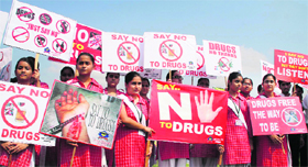 Students participate in an anti-drug rally organised by the Jammu police at Gulshan Ground in Jammu on Saturday.