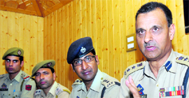 Srinagar SSP Ashiq Bukhari addresses a press conference in Srinagar on Saturday.