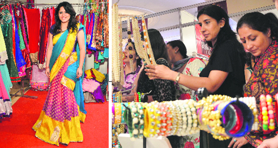 An exhibitor shows a ready-to-wear sari; and (right) visitors look at the jewellery during the Grand Asian Wedding Week Exhibition in Ludhiana on Saturday. Photo: Inderjeet Verma