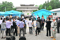 Journalists and government delegations from the UN allied nations visit the demilitarised zone dividing the two Koreas, on Saturday. AFP