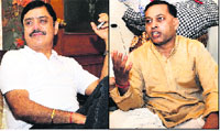 Bharat Rattan Grover, advocate; and (right) Lal Bahadur Dubey, priest.