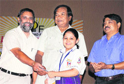 A student being awarded during the state-level SOF award ceremony at the Kanya Maha Vidyalaya in Jalandhar on Sunday. 