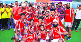 Winners Punjab strike a pose after winnng the meet.