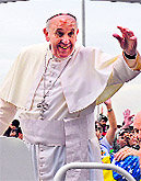 Catholic pilgrims attend World Youth Day and (right) Pope Francis waves at faithfuls at the Copacabana beach in Rio de Janeiro on Sunday