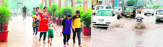 Residents enjoy the rain in GT Road area; (right) vehicles wade through rainwater which accumulated on the road in Amritsar on Monday.