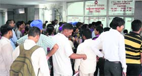 A huge rush at the X-ray/ultrasound fee counter at the New OPD, PGI