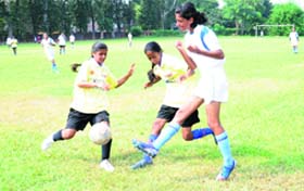 Players in action during a soccer match at Government Model Senior Secondary School, Sector 22, in Chandigarh on Monday