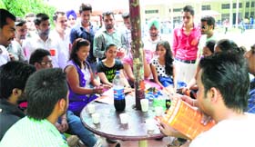 Workers of PUSU hold a meeting with their leaders at DAV College, Sector 10, Chandigarh