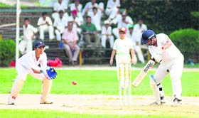 A batsman plays a shot during a cricket match at Vivek High School, Sector 38, in Chandigarh on Monday