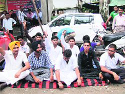 Members of the National Students Union of India hold a demonstration in Dehradun on Monday. 